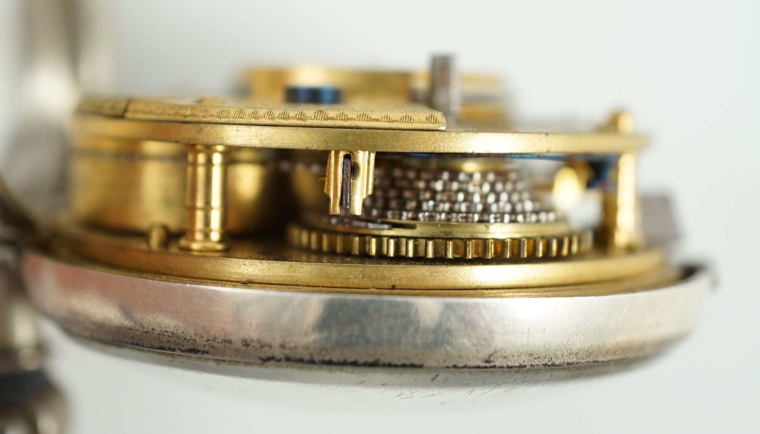 A Victorian silver pair cased pocket watch by Edward Fowle, Westerham and a gilt metal pocket watch missing outer case